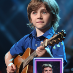 Prepare to be blown away, Watch as a first grader shocks an entire audience with a jaw dropping rendition of a Johnny Cash classic that sounds unbelievably beyond his years, You have never seen talent like this before