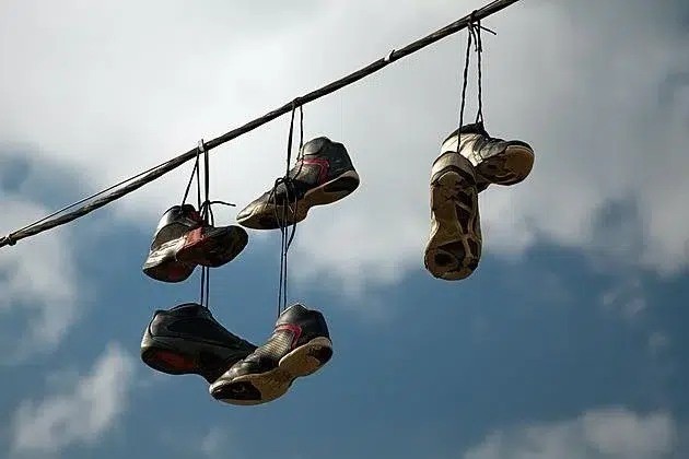 The Mystery of Shoes Hanging from Power Lines