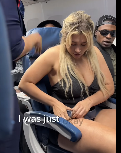 Girl signals for help on plane 😱