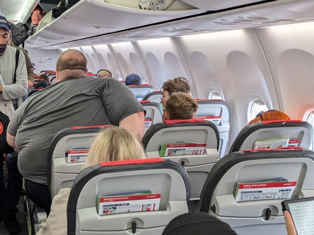 Photo of passenger on flight goes viral, has everyone saying the same thing