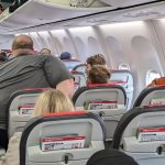 Photo of passenger on flight goes viral, has everyone saying the same thing