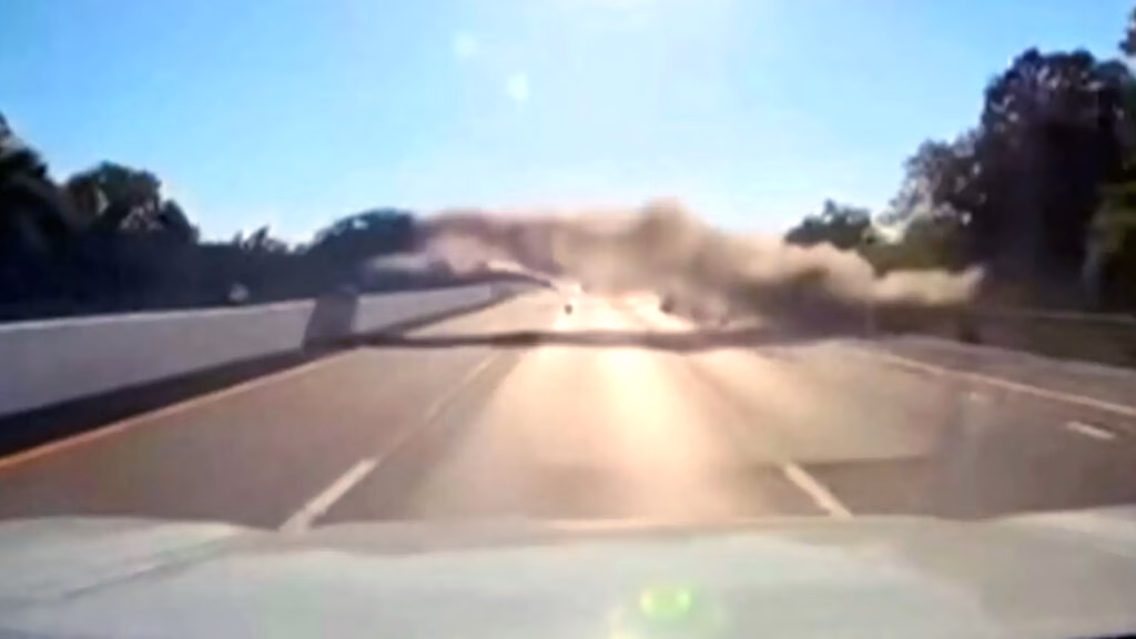 Car goes flying over several lanes of traffic on Long Island highway